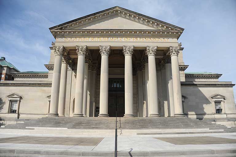 Entrance with 8 Corinthian columns and stairs